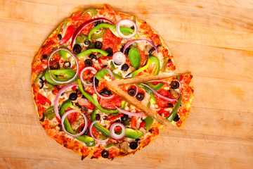Pizza with vegetables and pepperoni