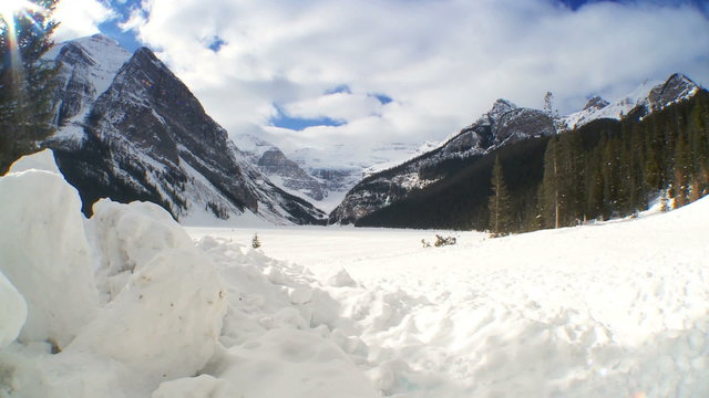 Lone female enjoying the beauty of a winter snow landscape