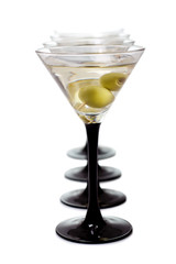 Martini with olives on a white background