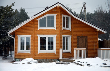 Classic wooden house in rural city on winter time