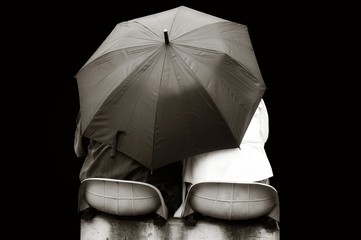 Lovers under umbrella