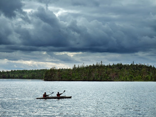 Naklejka premium canoe travel on lake