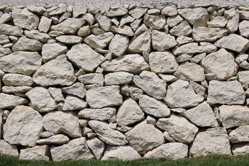 Wall background with grass below