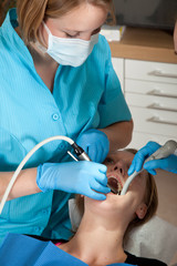 Dentist drilling a cavity