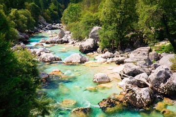 Fototapeta na wymiar Emerald coloured alpine river Soca / Isonzo, Slovenia