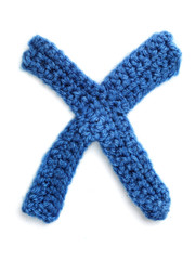 One letter of knit handmade alphabet - X