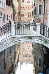 bridge of the small canal in the city of Venice