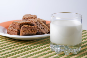 Glass of milk and waffles