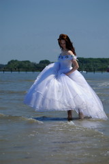 Fototapeta na wymiar Bride on a beach