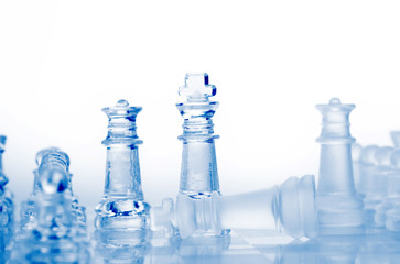 glass chess pieces with blue light