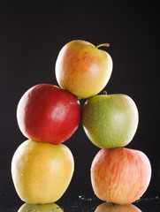 Apples on black background