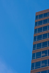 Blue Office Windows by a Blue Sky