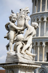 Pisa - angles sculpture and hanging tower