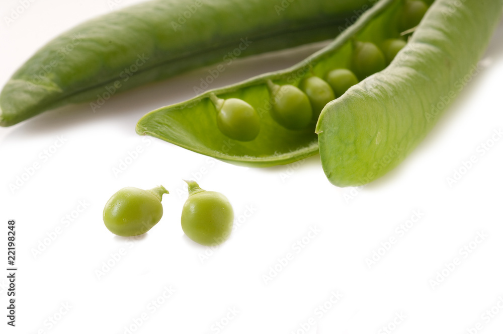 Wall mural open pod with peas selctive focus on the first