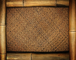 bamboo frame on rattan background