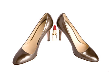 Shoes on a high heel and lipstick