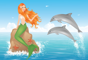Sirène et deux dauphins.