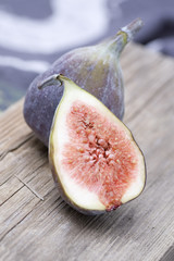 Fresh figs on a wood plate
