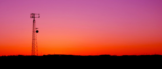 Naklejka premium Magenta Cell Phone Tower Panaramic