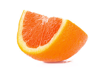 Slice of orange isolated on white