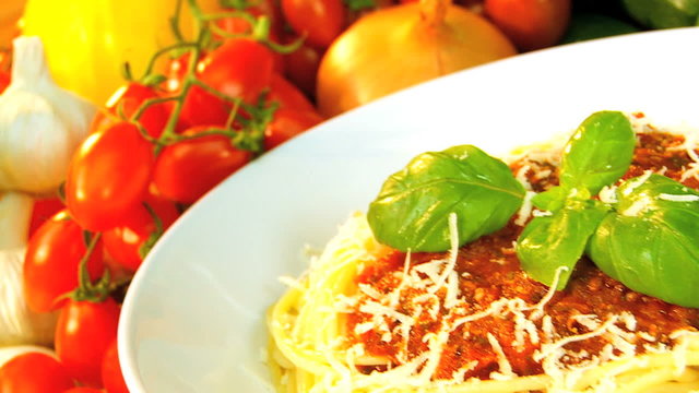 Fresh parmesan cheese on healthy spaghetti bolognese
