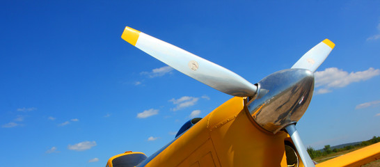 Aircraft propeller against a blue sky