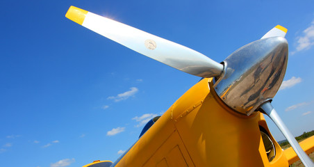 Aircraft propeller against a blue sky