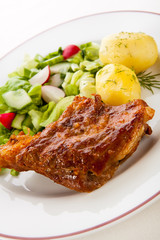 Tasty grilled ribs with vegetables