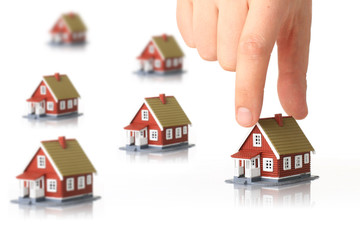 Small houses and hand.