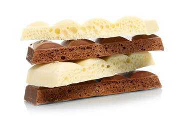 Stack of brown and white porous chocolate