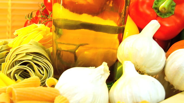 Fresh vegetarian ingredients of vegetables, pasta & olive oil