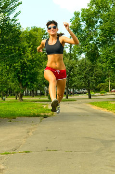young woman running in the park