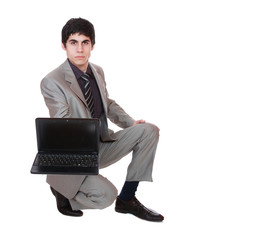 Business man displaying a laptop