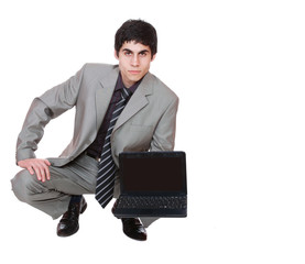 Business man displaying a laptop