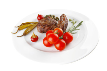 grilled meat medallion with cherry tomatoes