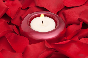 Candle and rose petals