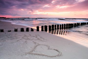 Fototapeta premium Calmness.Beautiful sunset with symbol of love.