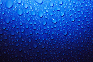 blue water drops on glass