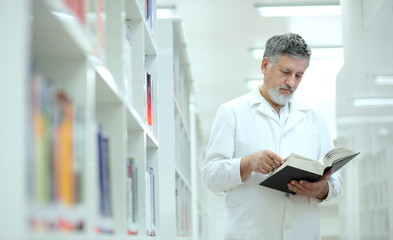 Renowned scientist/doctor in a library of research center/hospit