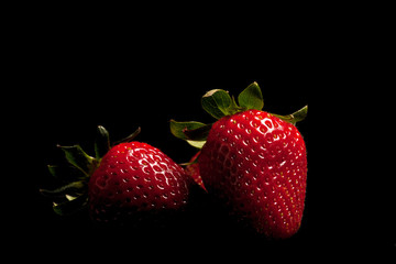 Strawberries on black background