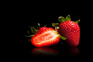 Strawberries on black background