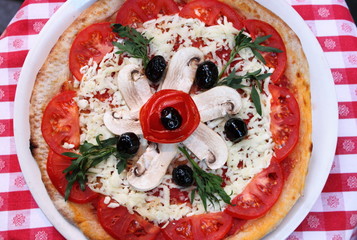 Pizza with mozzarella and mushrooms