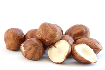 Hazelnuts on white background