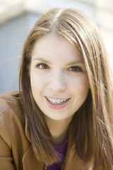 portrait young smiling woman with long hair