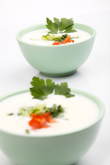 Yogurt soup with vegetables (focus on background)