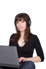 student girl with laptop and headphones