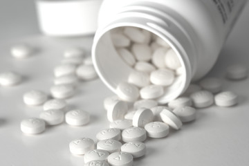 Close-up of prescription pills scattered around