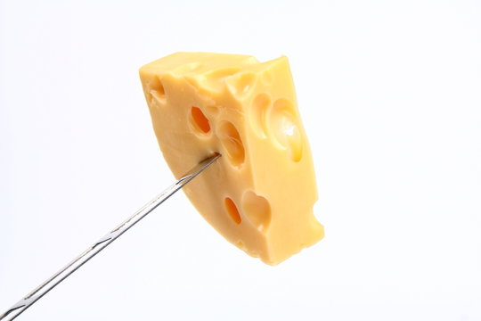 Some cheese on a cheese knife