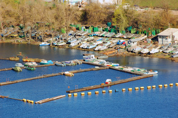 Many boats yacht moored in river pier