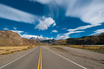 vibrant image of highway and blue sky